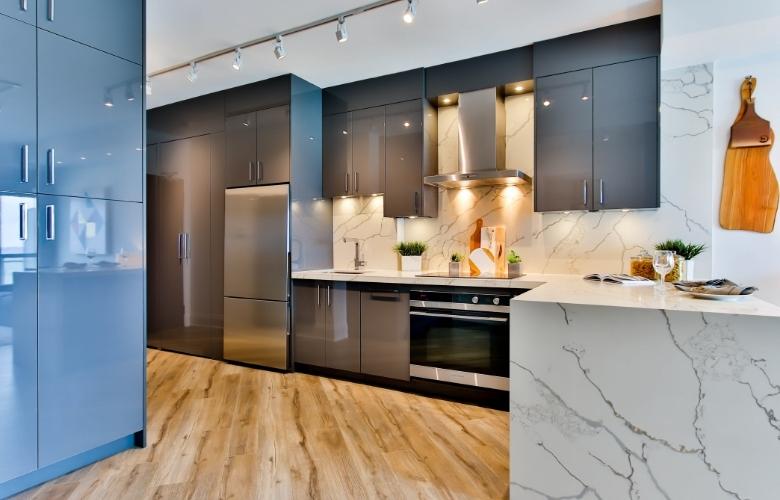 Elegant L-shaped kitchen design with built-in kitchen appliances - Beautiful Homes