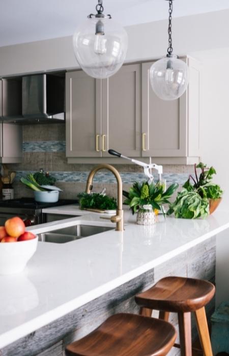 L-shaped modular kitchen with dining space on the kitchen counter - Beautiful Homes