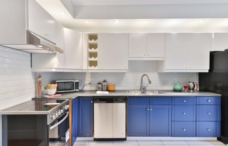 Spacious L-Shaped Kitchen Design With Tinted Aqua-Blue Cabinets