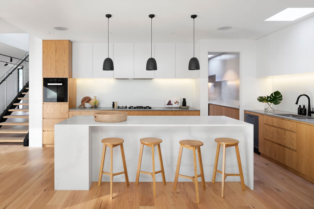 Wooden flooring & hanging lights to enhance your kitchen design - Beautiful Homes
