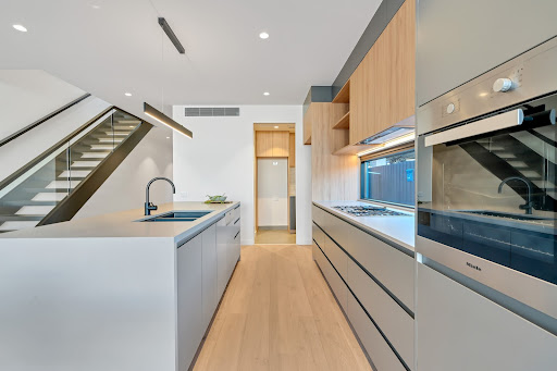 Parallel kitchen interior design with ample kitchen storage - Beautiful Homes