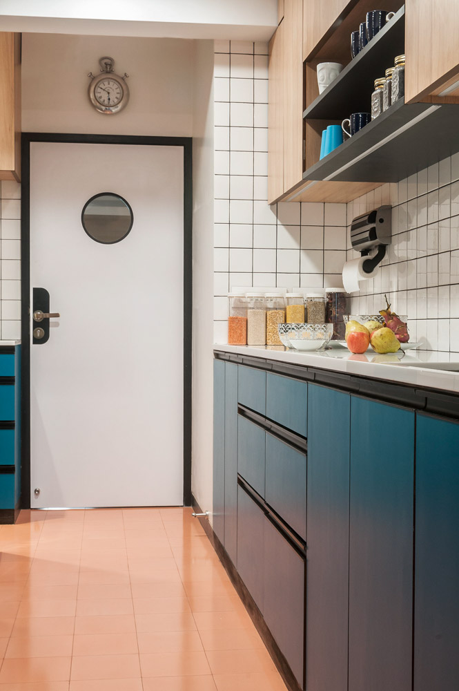 Modern Kitchen Design win Turquoise Storage Cabinet and Black Grouting on White Tiles - Beautiful Homes