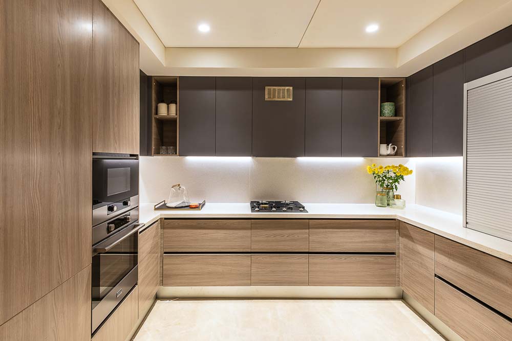 wall of tall cabinet in u shaped kitchen