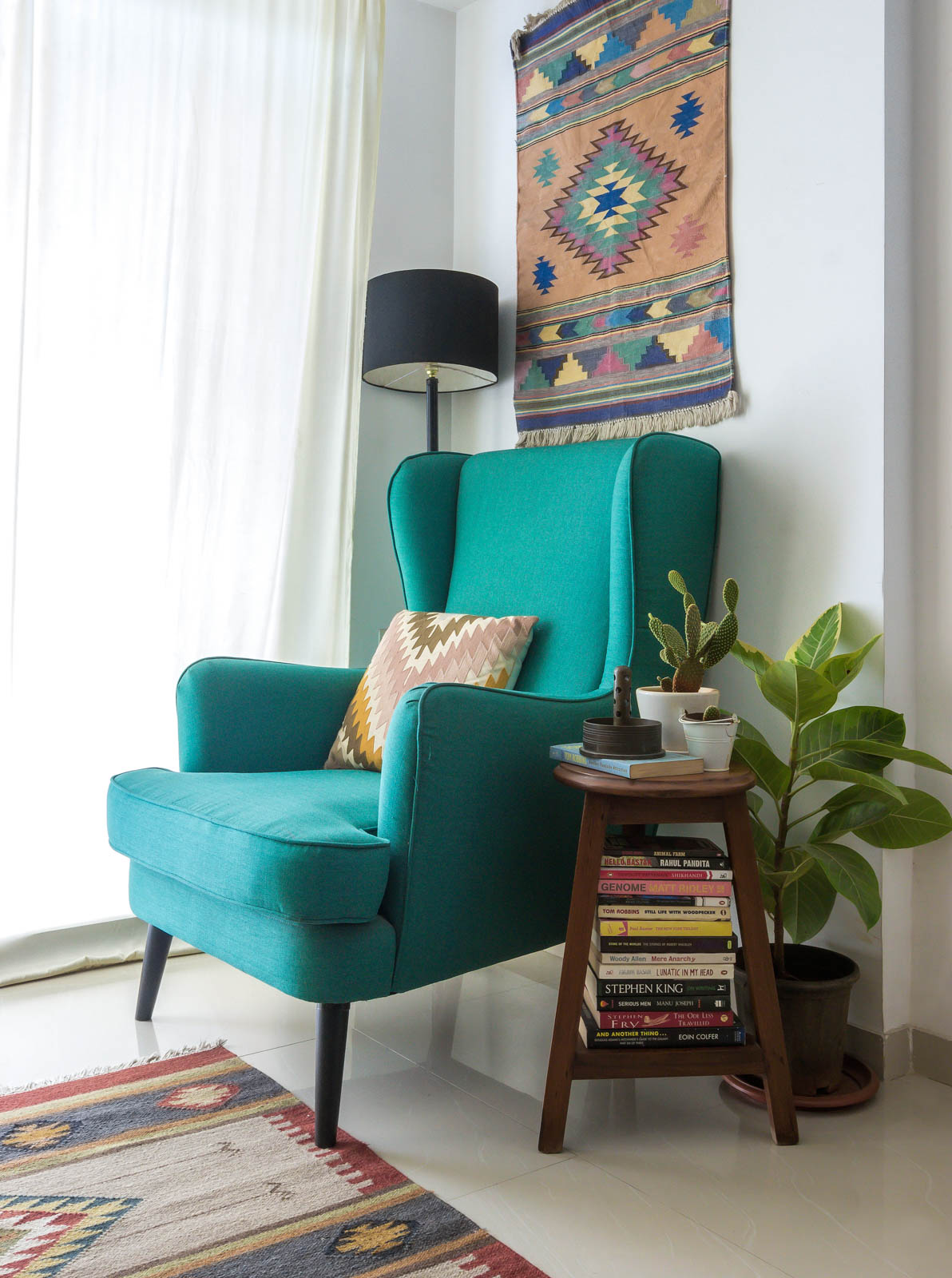 Reading Corner Design Ideas For Living Room With Wingback Chair & Kilim Rug - Beautiful Homes