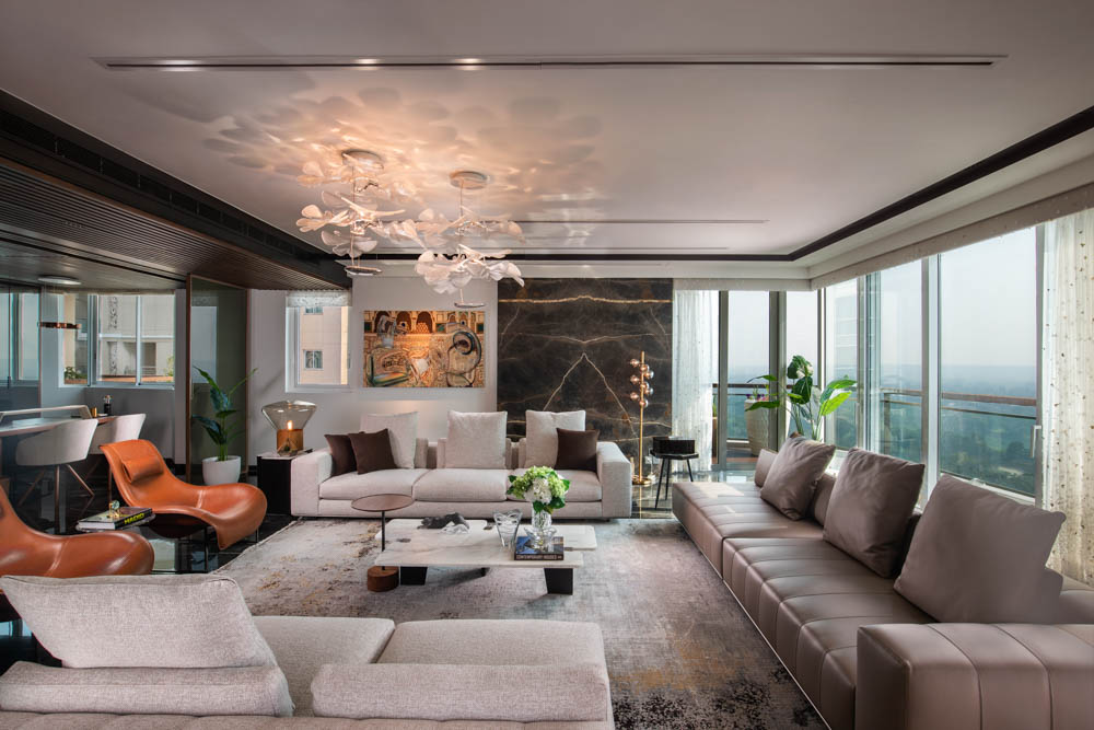 Symmetrical & asymmetrical sofa set arrangement with matching colour palette - Beautiful Homes
