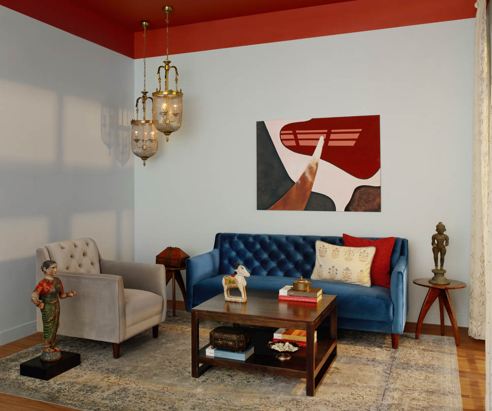 Use big wall artwork in the small living room for a bigger feel - Beautiful Homes