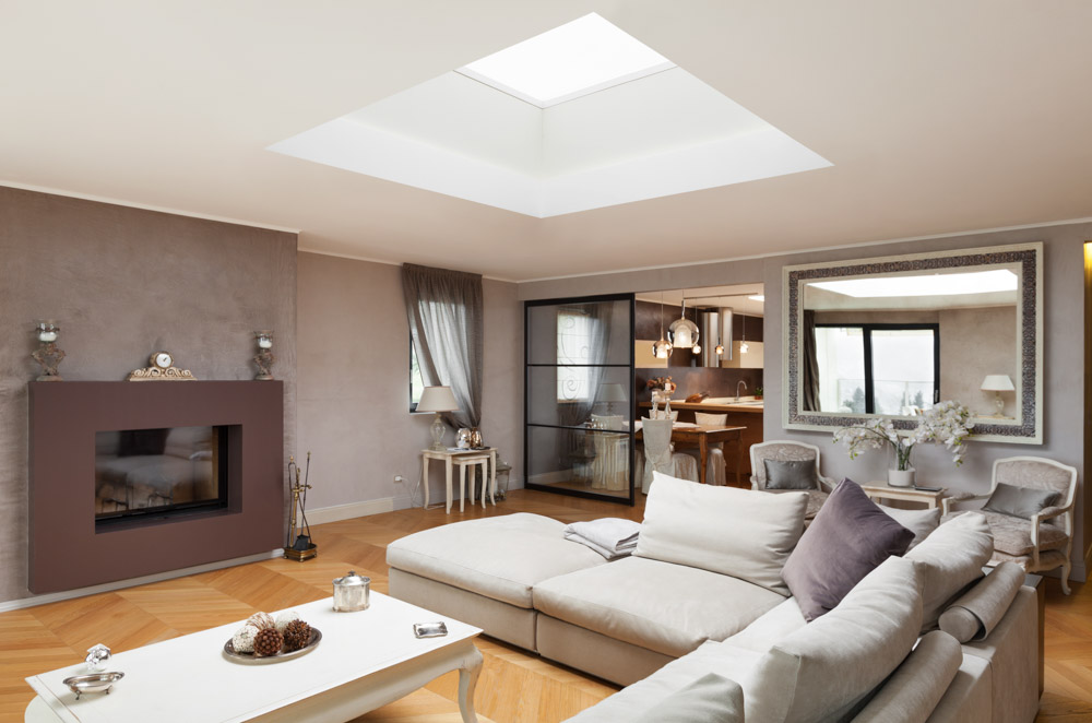 Modern flat skylight that aligns with the roof of your modern living room - Beautiful Homes