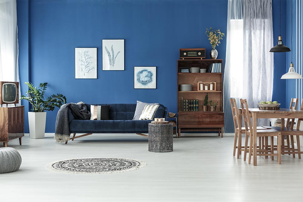 Living room design with blue walls - Beautiful Homes