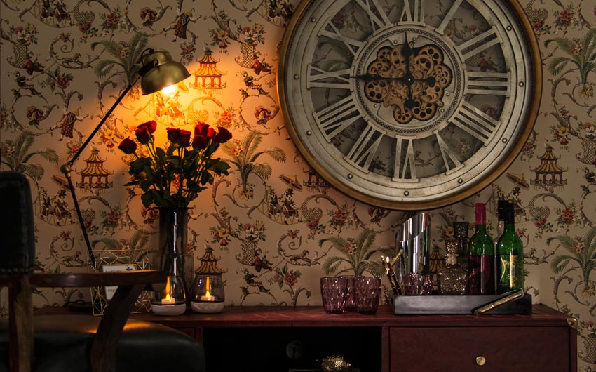 Vintage Home Bar Design In Maroon & Gold, With Printed Wallpaper, Metal Lamp & Clock - Beautiful Homes