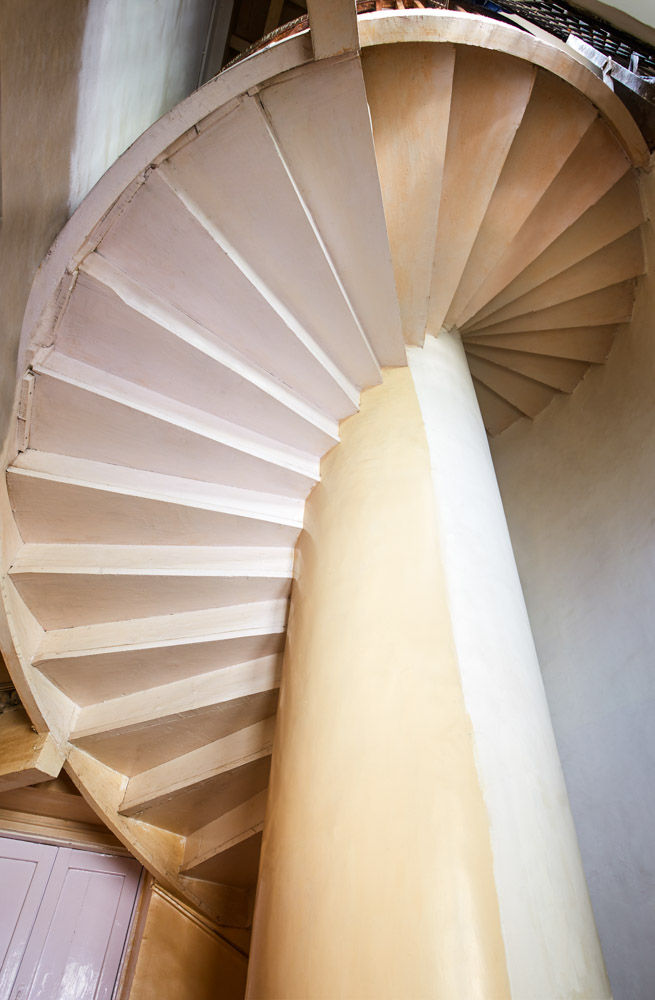 A spiral staircase leading up to the office of designer Ritu Nanda - Beautiful Homes