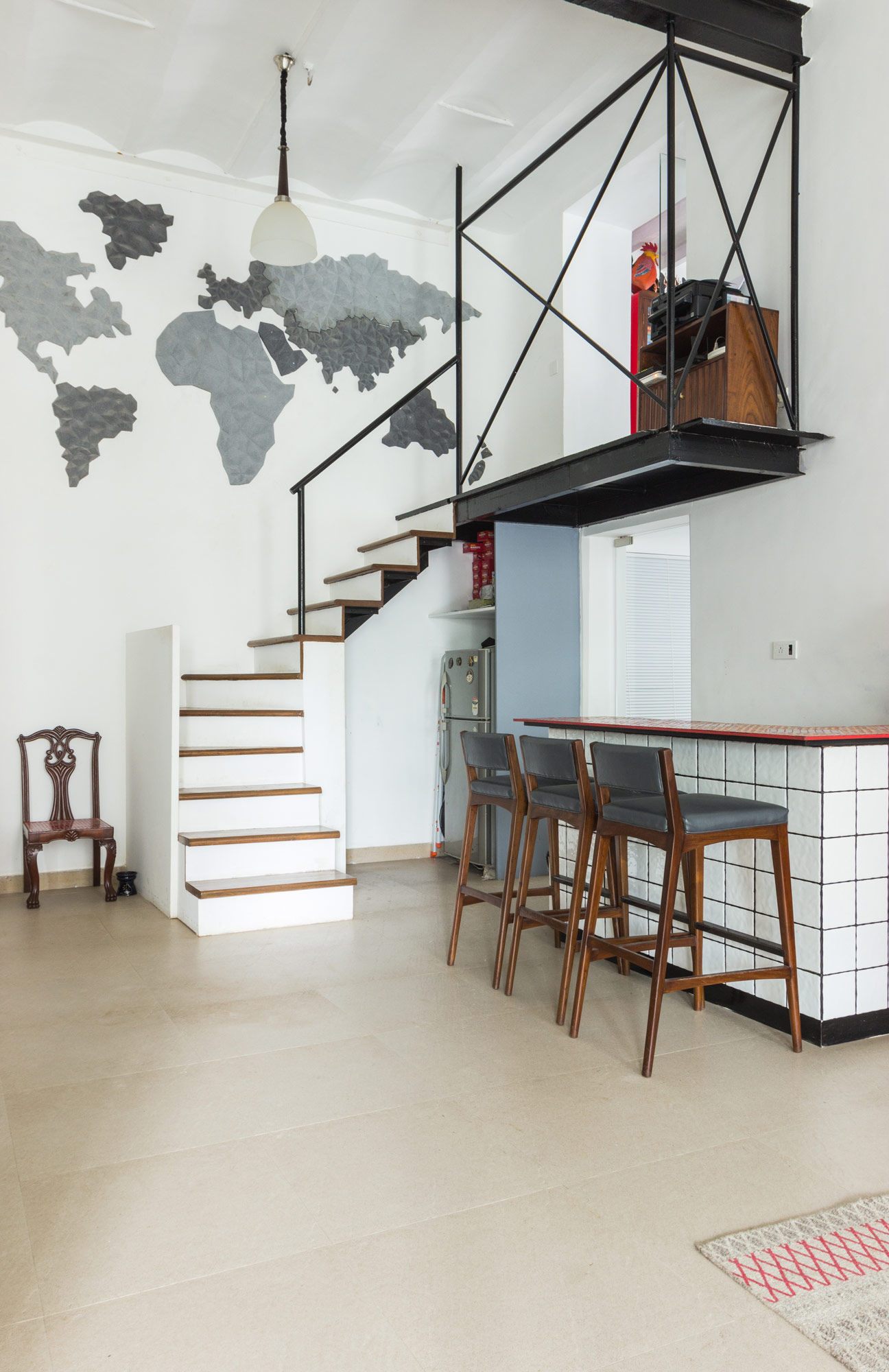 The staircase connecting the ground floor to the common work area upstairs - Beautiful Homes