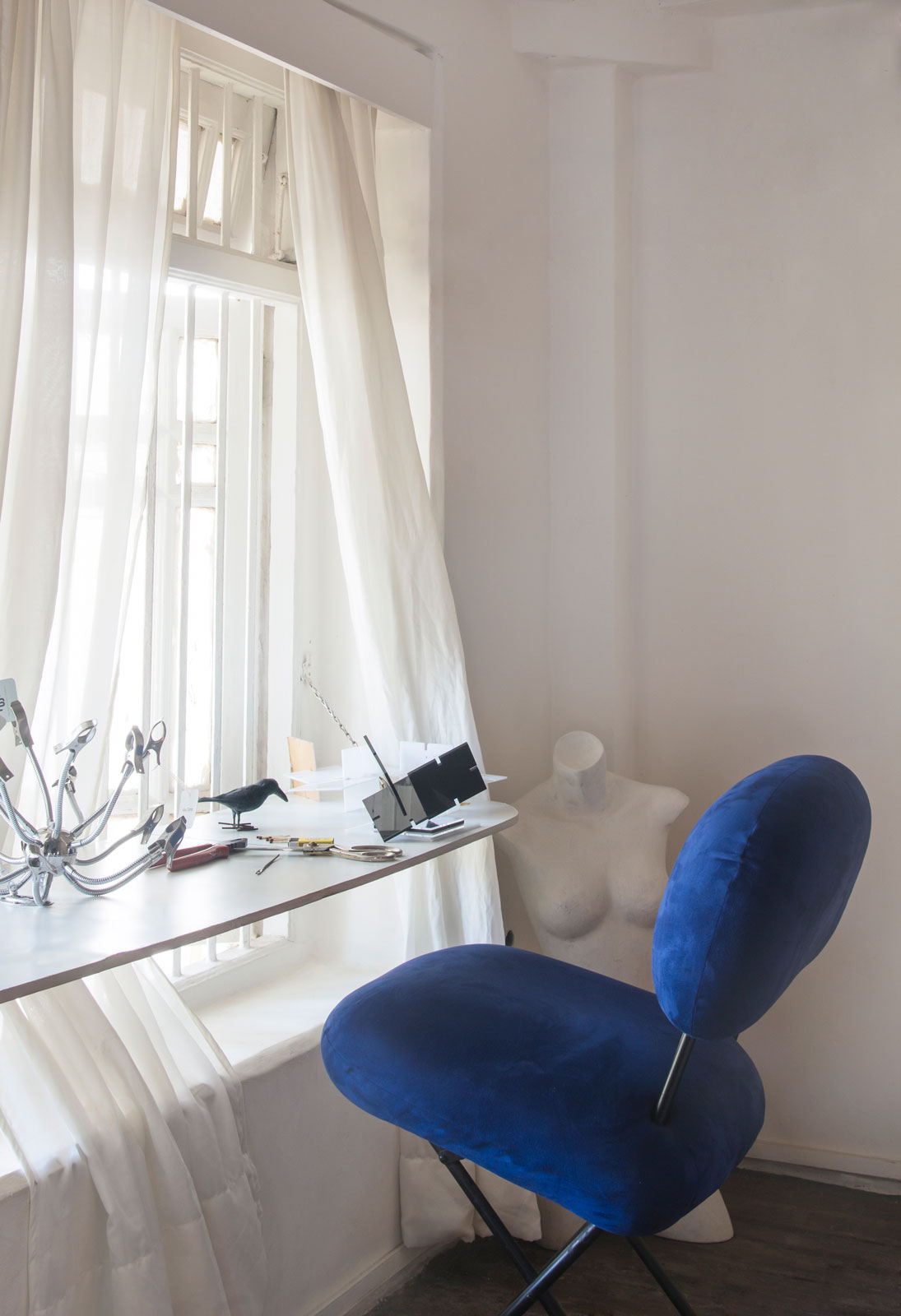 Miniature models decorated in a corner of The Upstairs Studio - Beautiful Homes