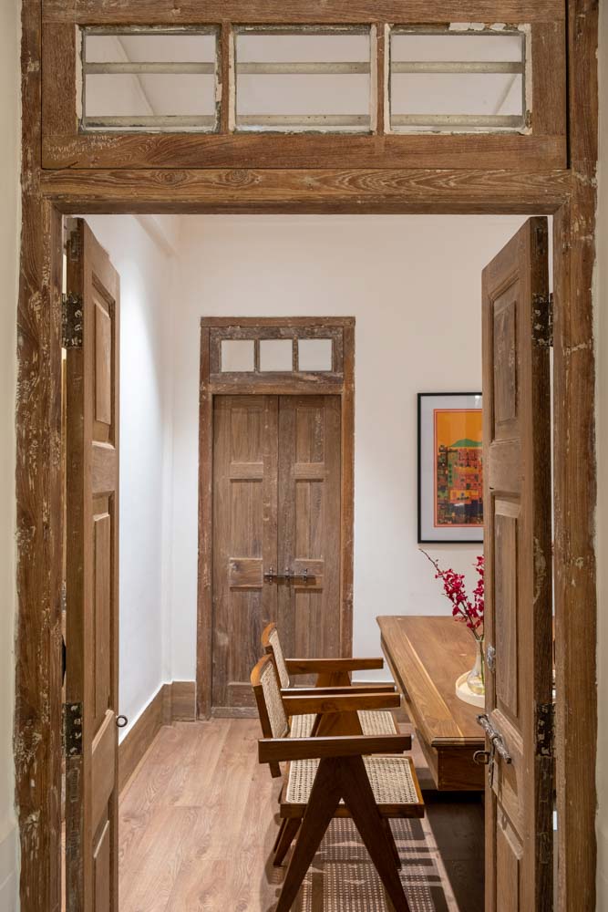 The chairs, solid wood furniture & wooden flooring was chosen for décor - Beautiful Homes