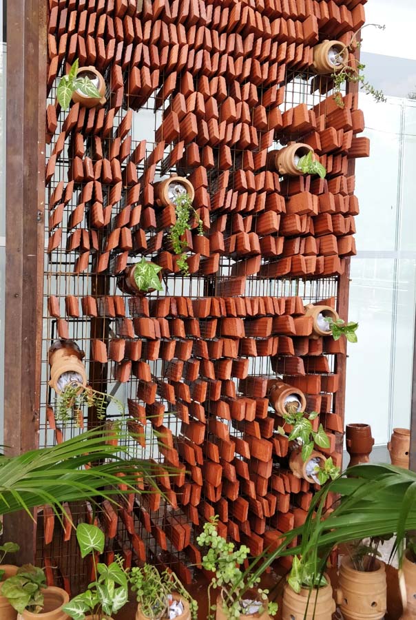 A tall structure using terracotta tiles stacked together