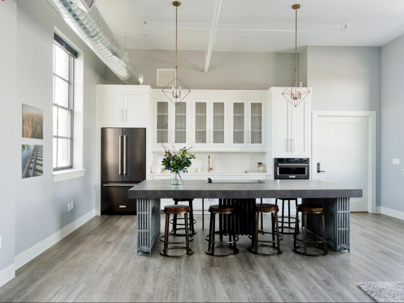 Linoleum floor in this straight modular kitchen design with breakfast nook - Beautiful Homes