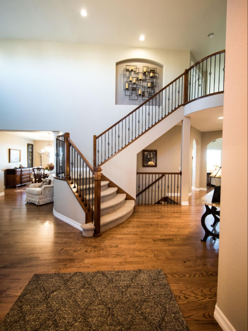 Shag rug design in a hallway of a big home interior design - Beautiful Homes