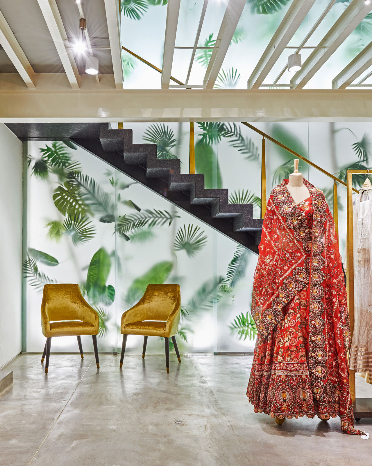 The 18-ft frosted glass wall at the store - Beautiful Homes